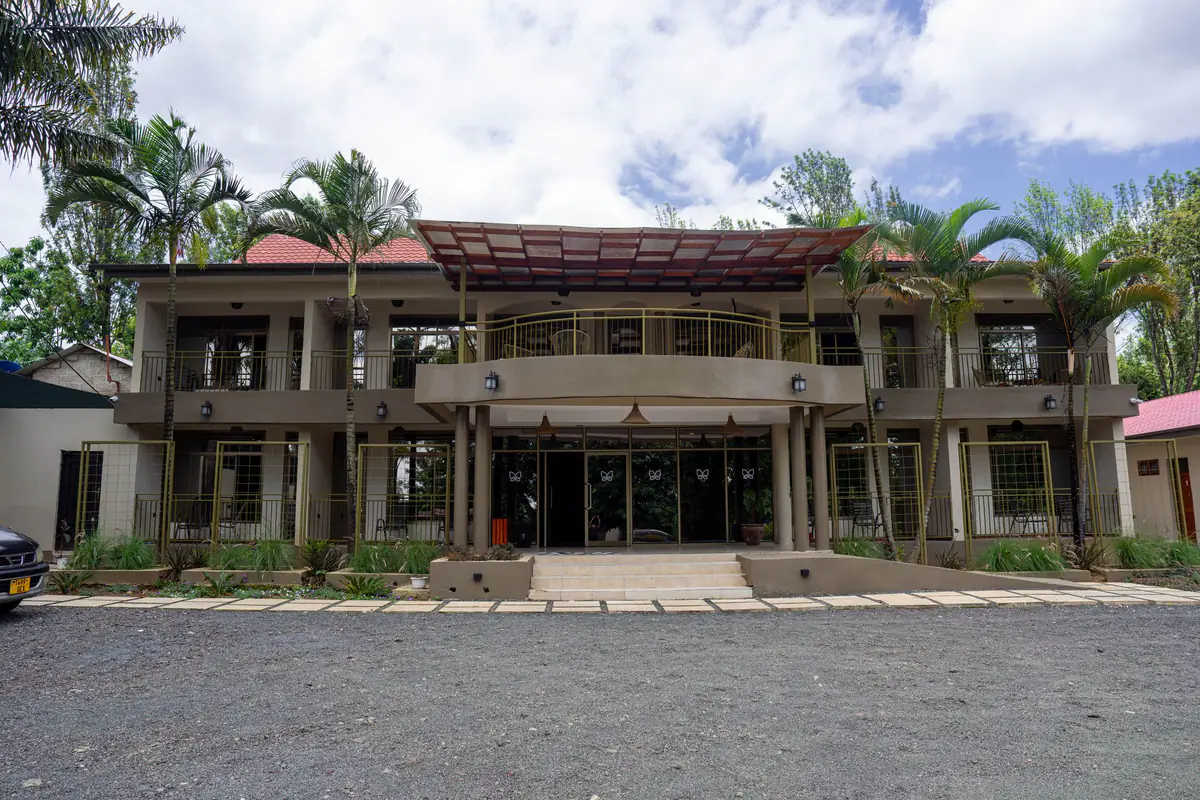 Main building and entrance of Mvuli Farm Lodge, Arusha
